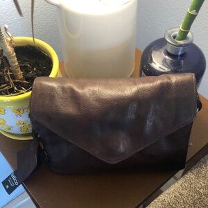 Latico Harbor crossbody in dark brown.